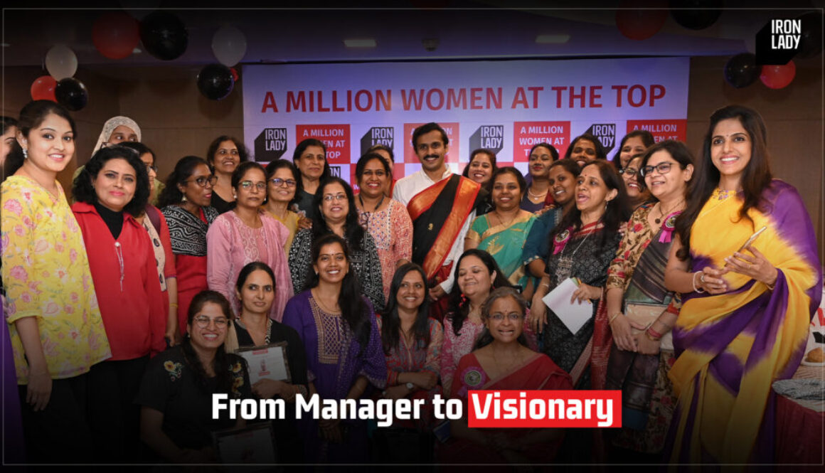 A group of women leaders celebrating their achievements at an Iron Lady event, showcasing the theme of transforming from managers to visionaries, with 'A Million Women at the Top' branding in the background.