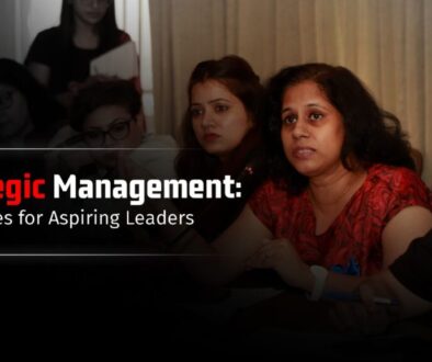 A group of professional women engaged in a discussion, with one woman actively speaking, symbolizing leadership and strategic management.